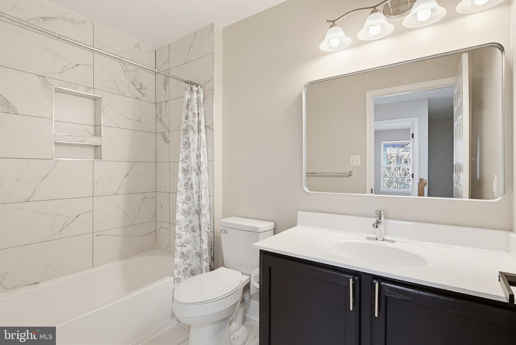 14603 Farnham Lane Laurel, MD 20707 - Photo 40 of 51 Updated bathroom on upper level hallway