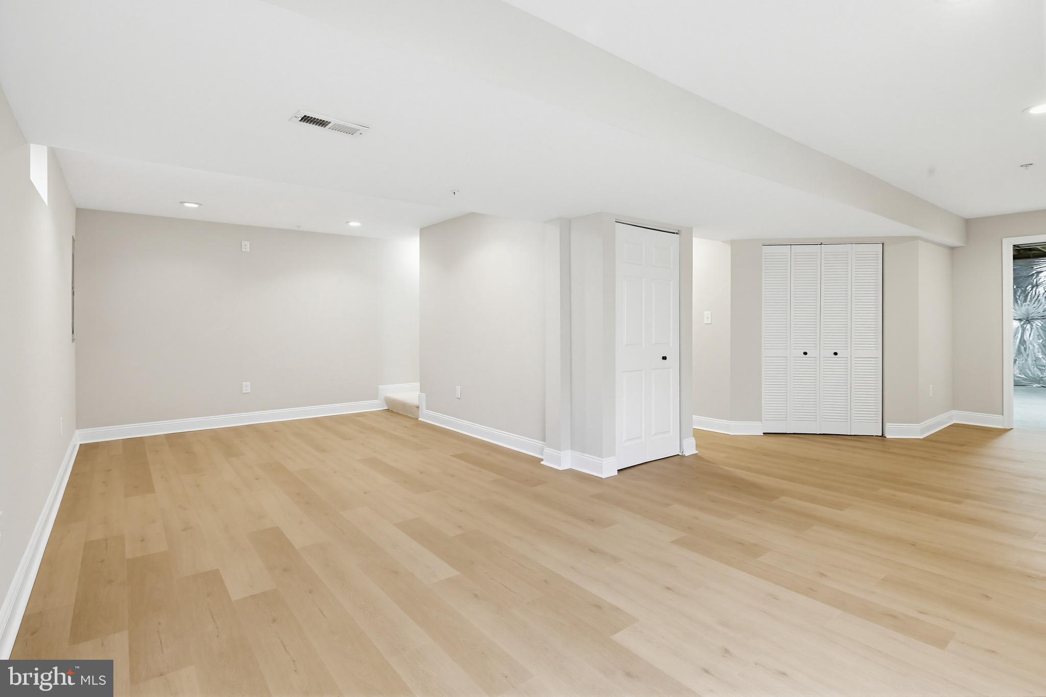 14603 Farnham Lane Laurel, MD 20707 - Photo 43 of 51 Lower level recreation room
