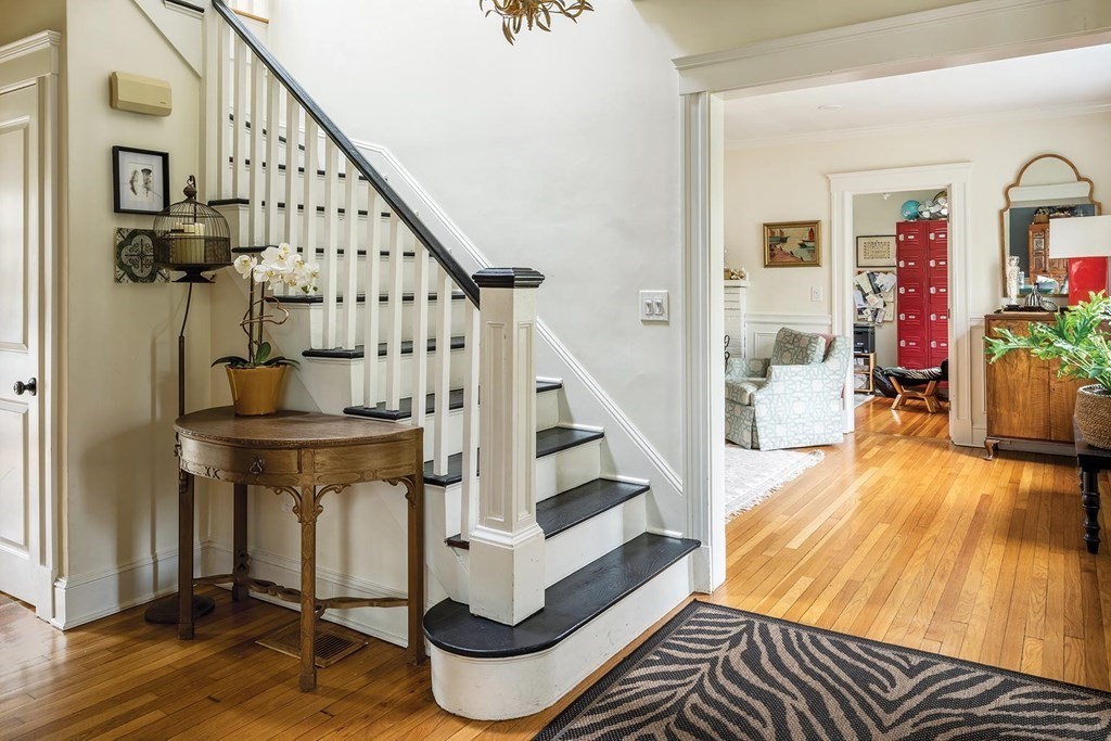 170 Oliver Road Newton, MA 02468 - Photo 2 of 13 a view of entryway and hall with wooden floor