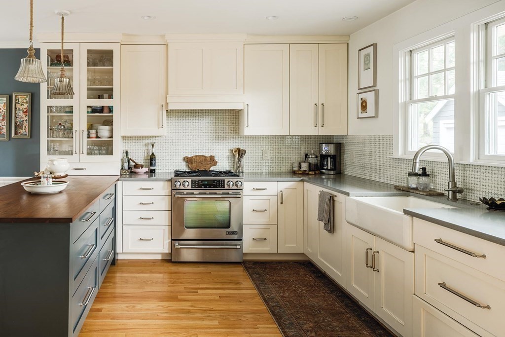 170 Oliver Road Newton, MA 02468 - Photo 6 of 13 a kitchen with cabinets appliances a sink and a window