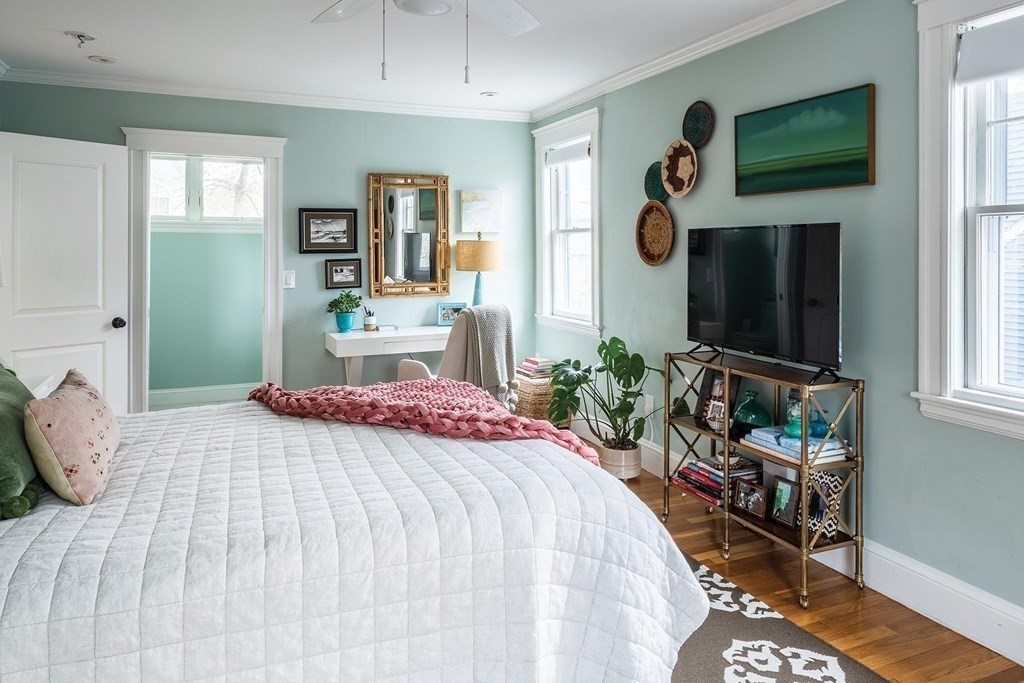 170 Oliver Road Newton, MA 02468 - Photo 8 of 13 a bedroom with a bed and a flat screen tv