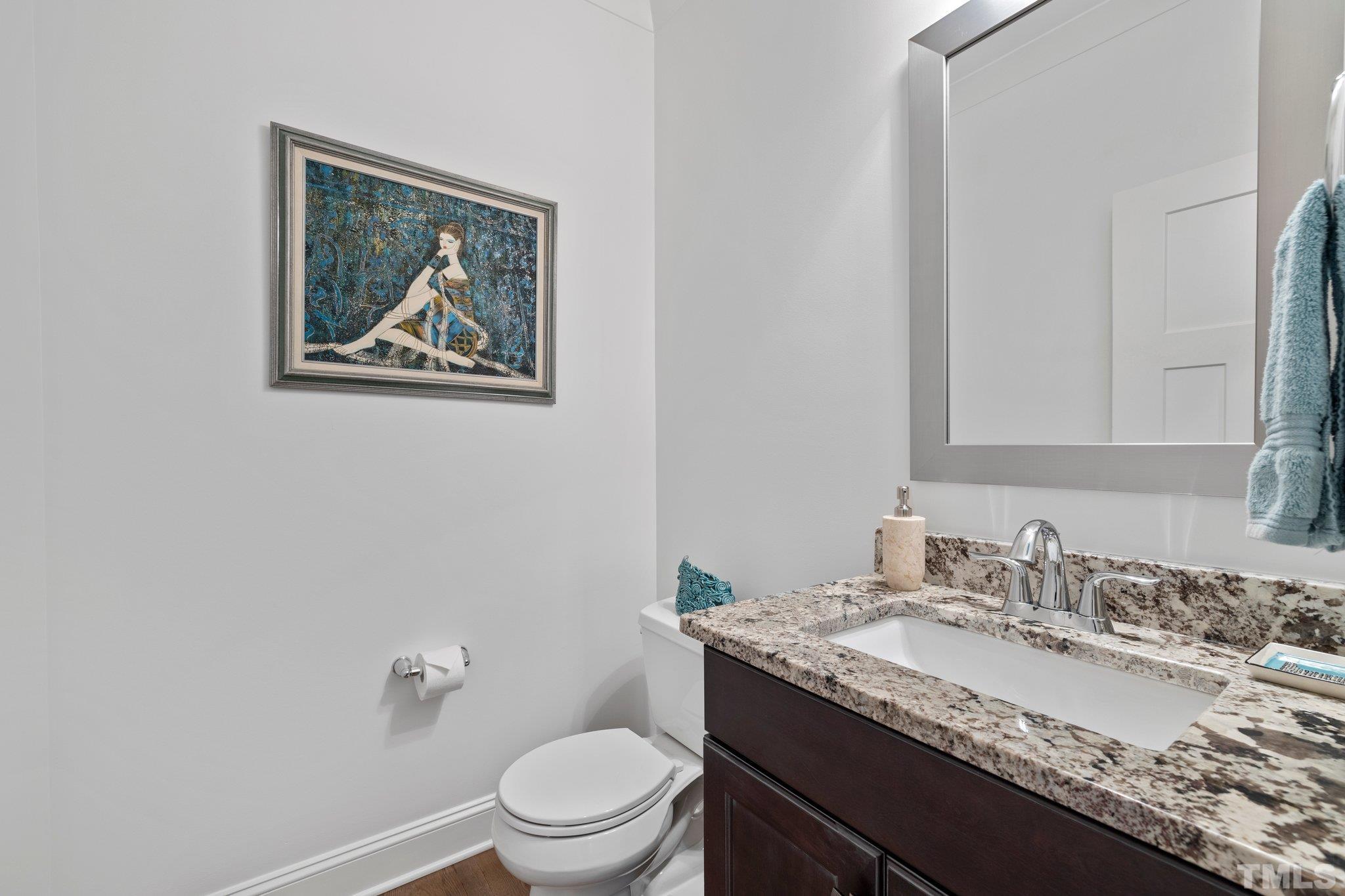 9508 Oakhurst Court Raleigh, NC 27614 - Photo 32 of 67 Roomy half bath with granite countertop and hardwoods.