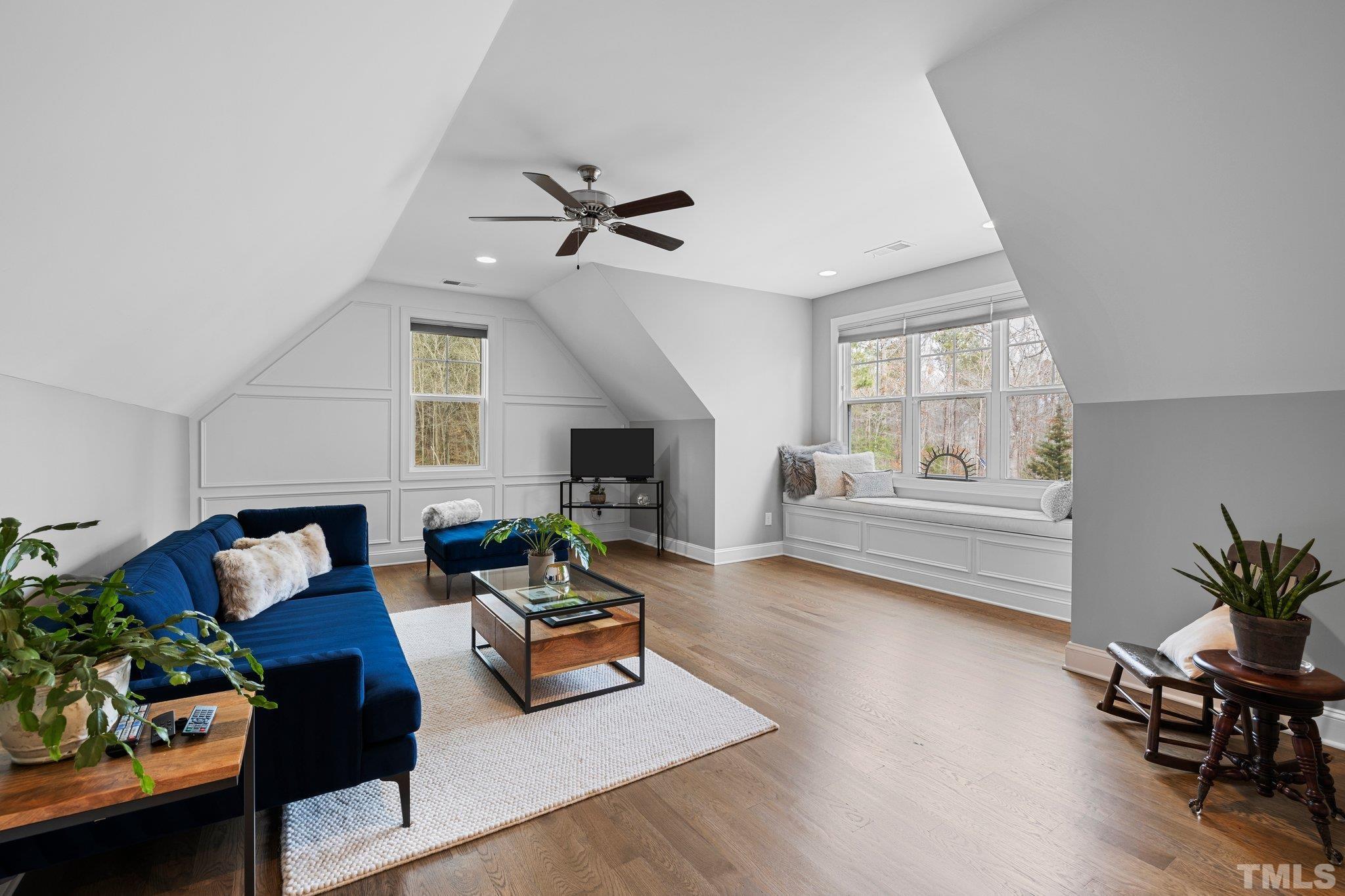 9508 Oakhurst Court Raleigh, NC 27614 - Photo 38 of 67 Oversized bonus with custom window seat, beautiful wainscoting, & custom window coverings.