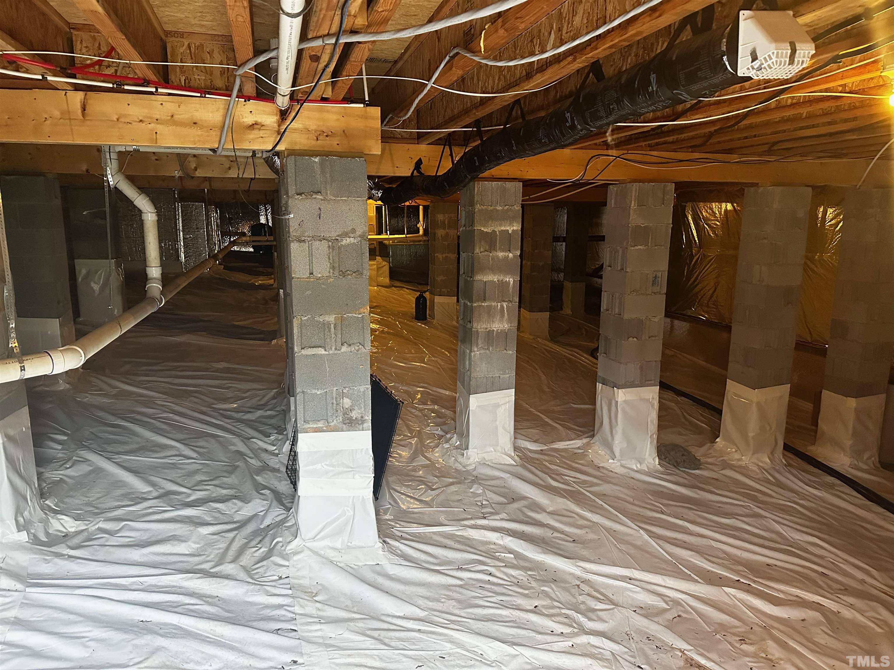 9508 Oakhurst Court Raleigh, NC 27614 - Photo 50 of 67 Large walk-in conditioned crawlspace great for additional storage.