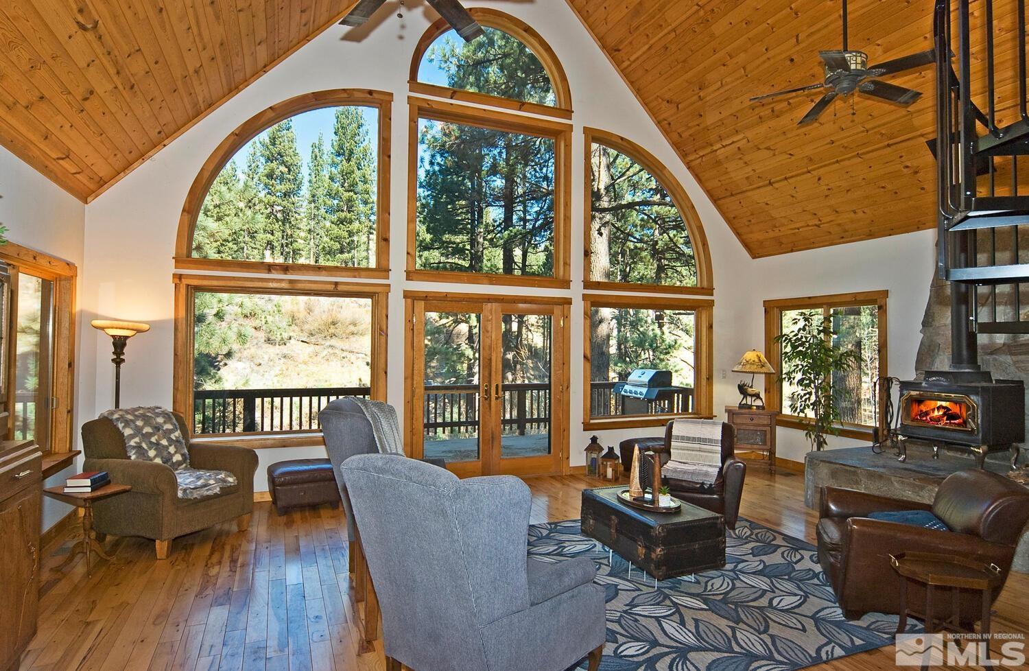 125 Pleasant Valley Road Markleeville, CA 96120 - Photo 16 of 36 a living room with furniture and a large window