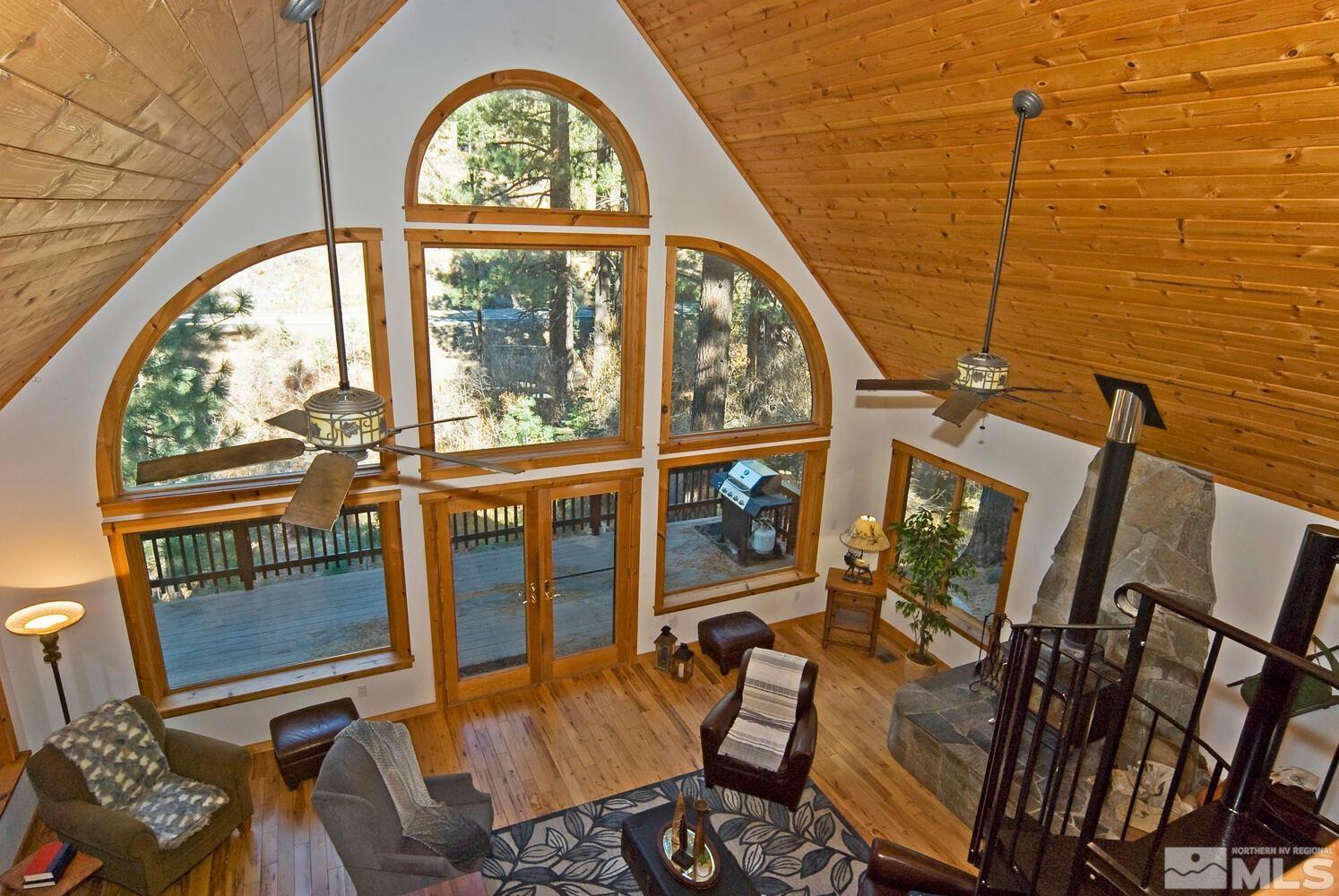 125 Pleasant Valley Road Markleeville, CA 96120 - Photo 19 of 36 a view of a porch with furniture and front door