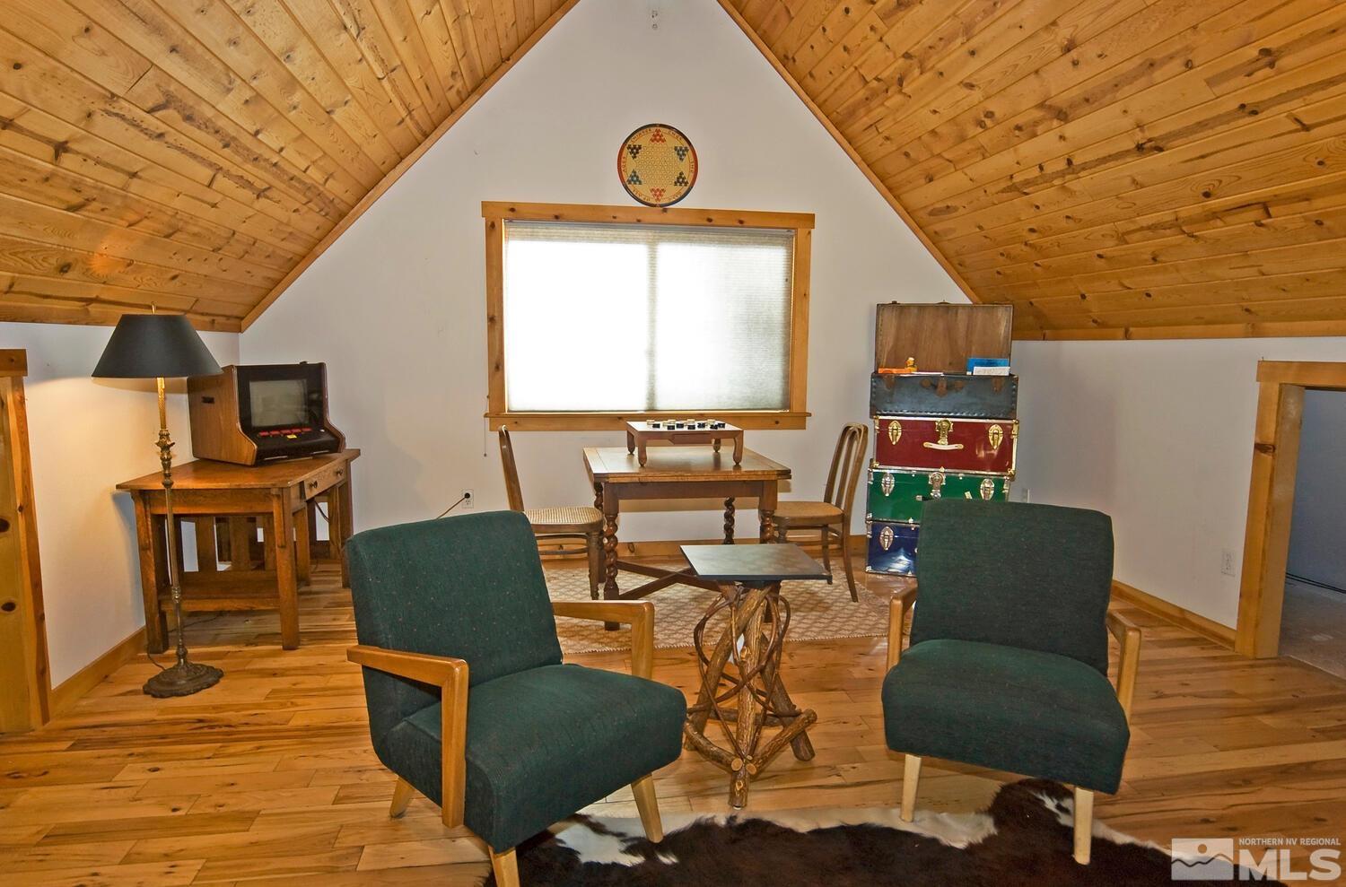 125 Pleasant Valley Road Markleeville, CA 96120 - Photo 20 of 36 a living room with furniture and a window