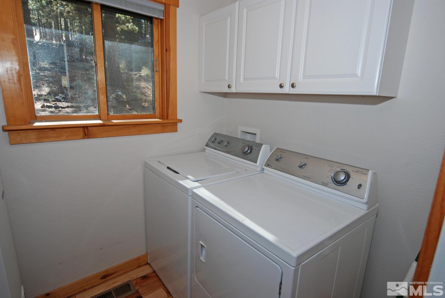 125 Pleasant Valley Road Markleeville, CA 96120 - Photo 30 of 36 a utility room with dryer and washer