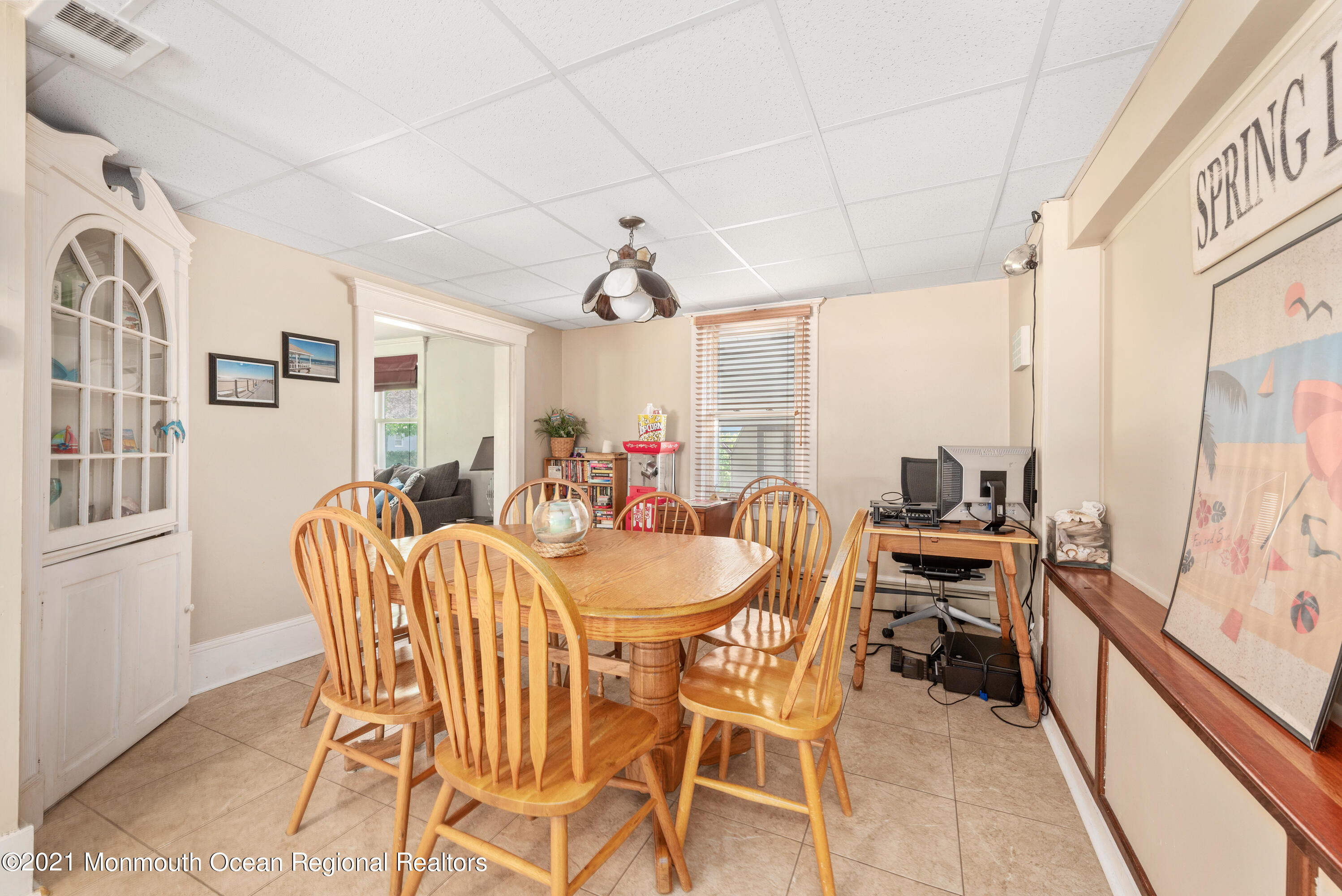 1709 Brighton Lane, Unit WINTER 2324 Spring Lake, NJ 07762 - Photo 13 of 27 a dining room with furniture and window