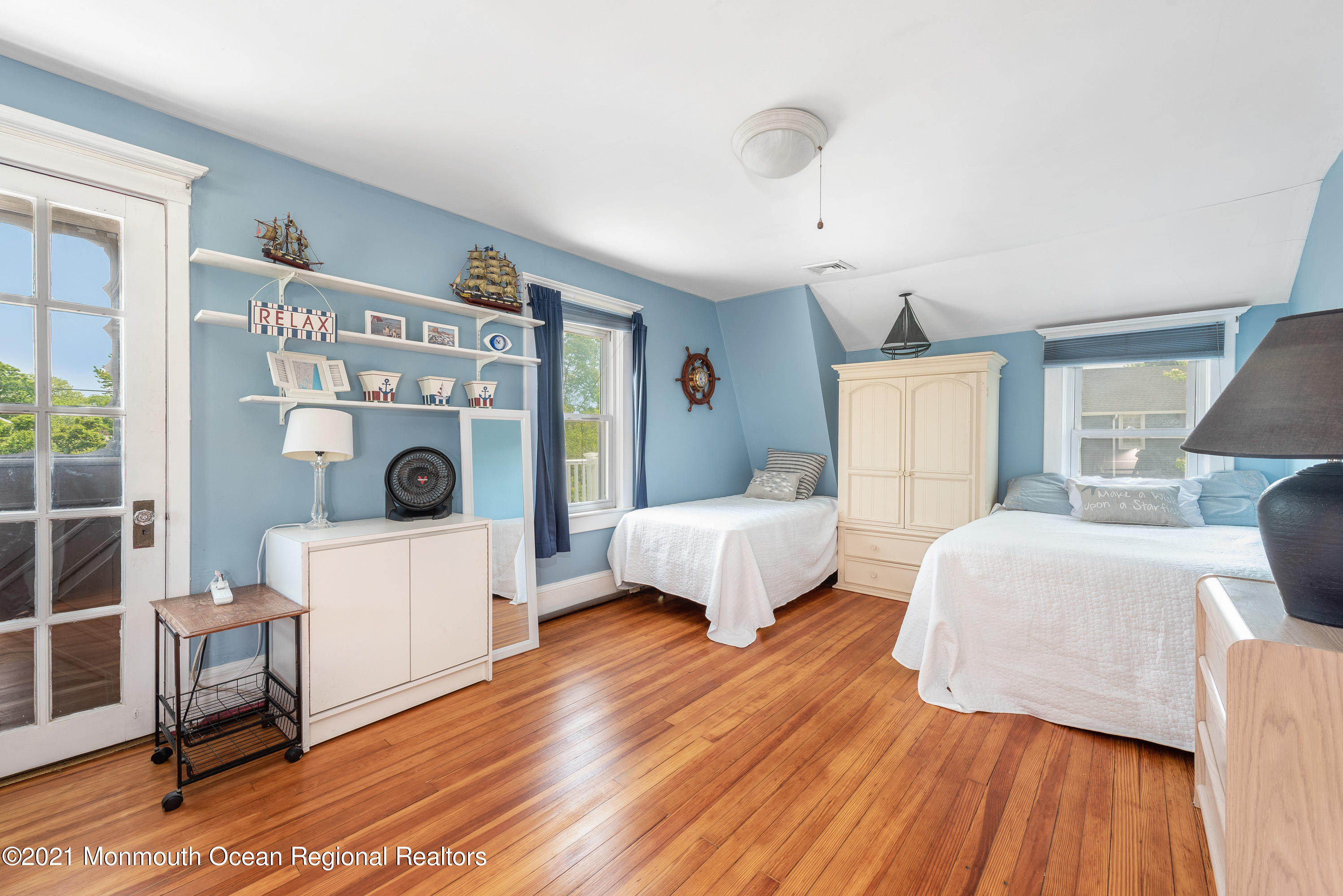 1709 Brighton Lane, Unit WINTER 2324 Spring Lake, NJ 07762 - Photo 20 of 27 a living room with furniture and a large window