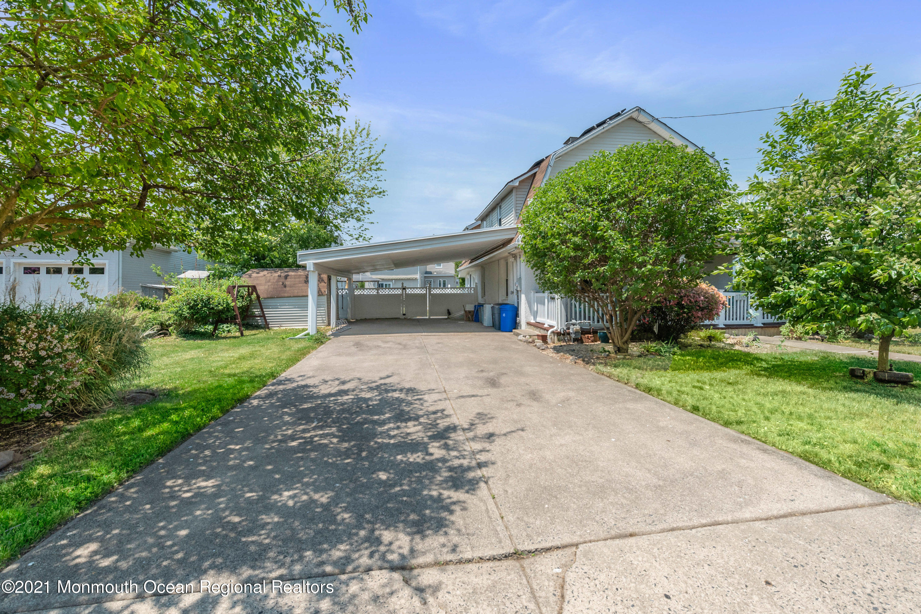 1709 Brighton Lane, Unit WINTER 2324 Spring Lake, NJ 07762 - Photo 27 of 27 a view of house with yard and green space