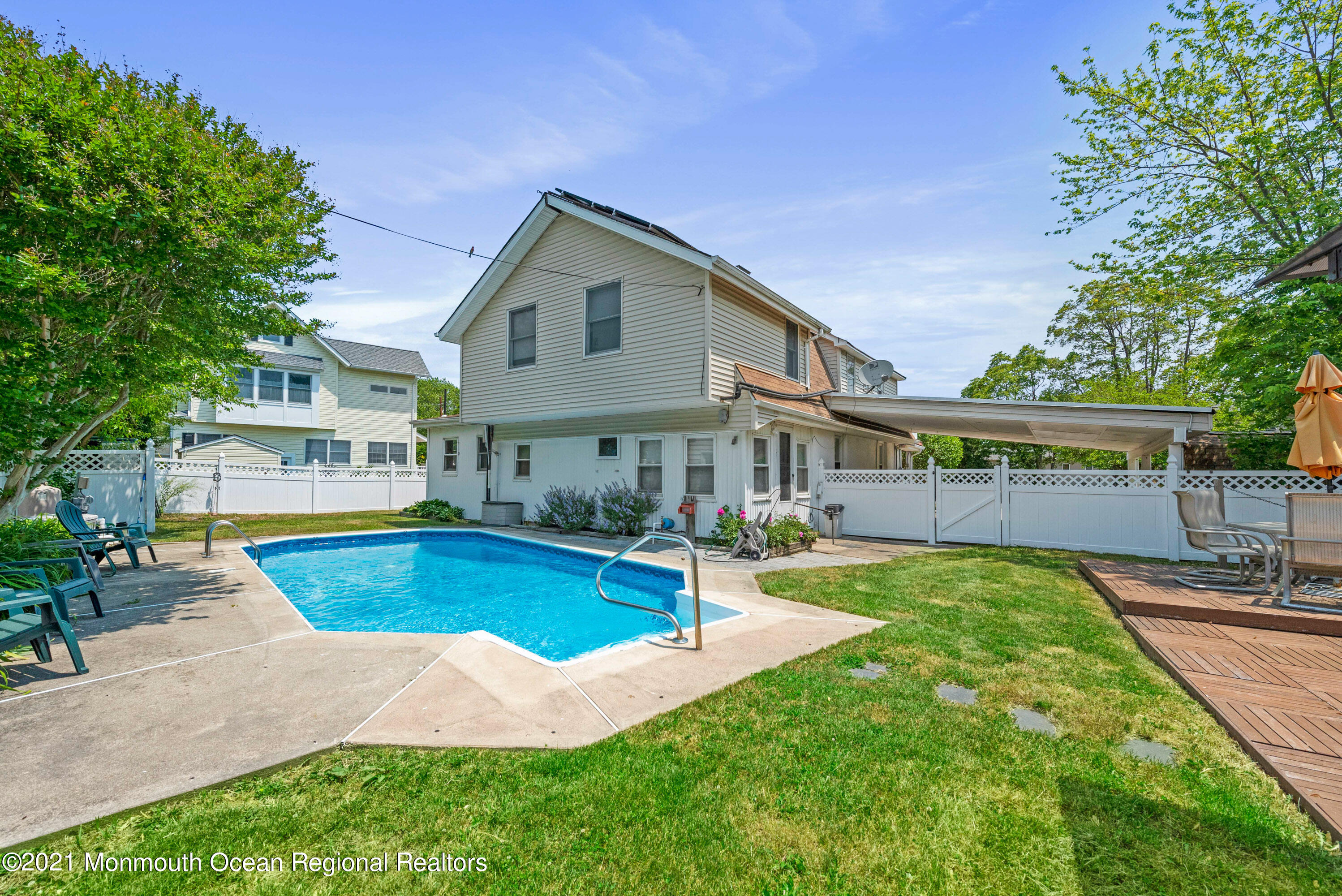 1709 Brighton Lane, Unit WINTER 2324 Spring Lake, NJ 07762 - Photo 4 of 27 a view of house with swimming pool outdoor seating