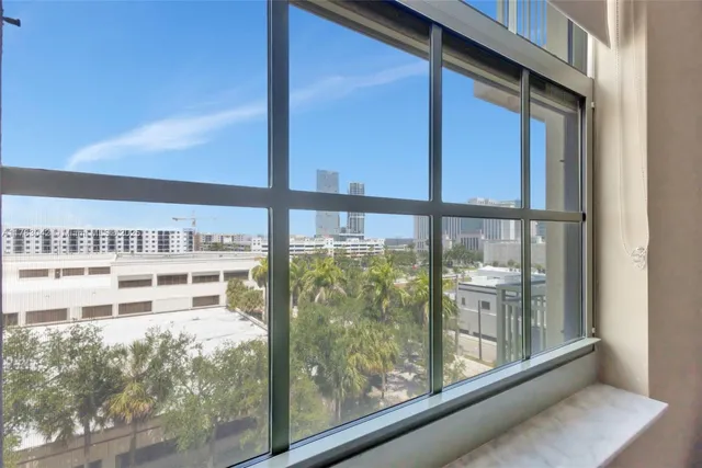 a view of a glass door of the house