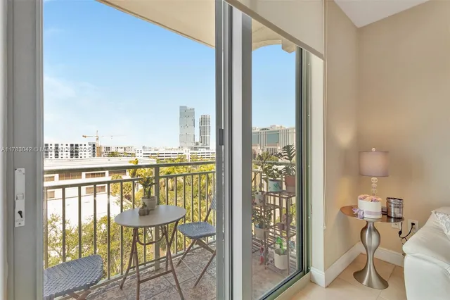 a view of a balcony with chairs