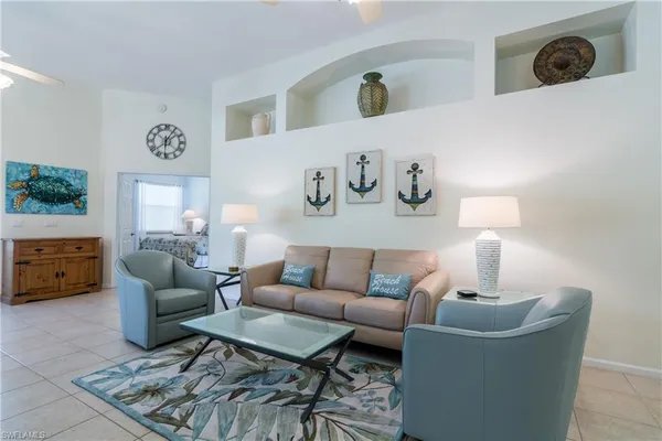 a living room with furniture and a couch