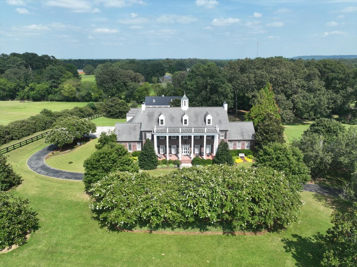 3062 Lower River Road Southeast Decatur, AL 35603 - Photo 1 of 70 an aerial view of a house with big yard