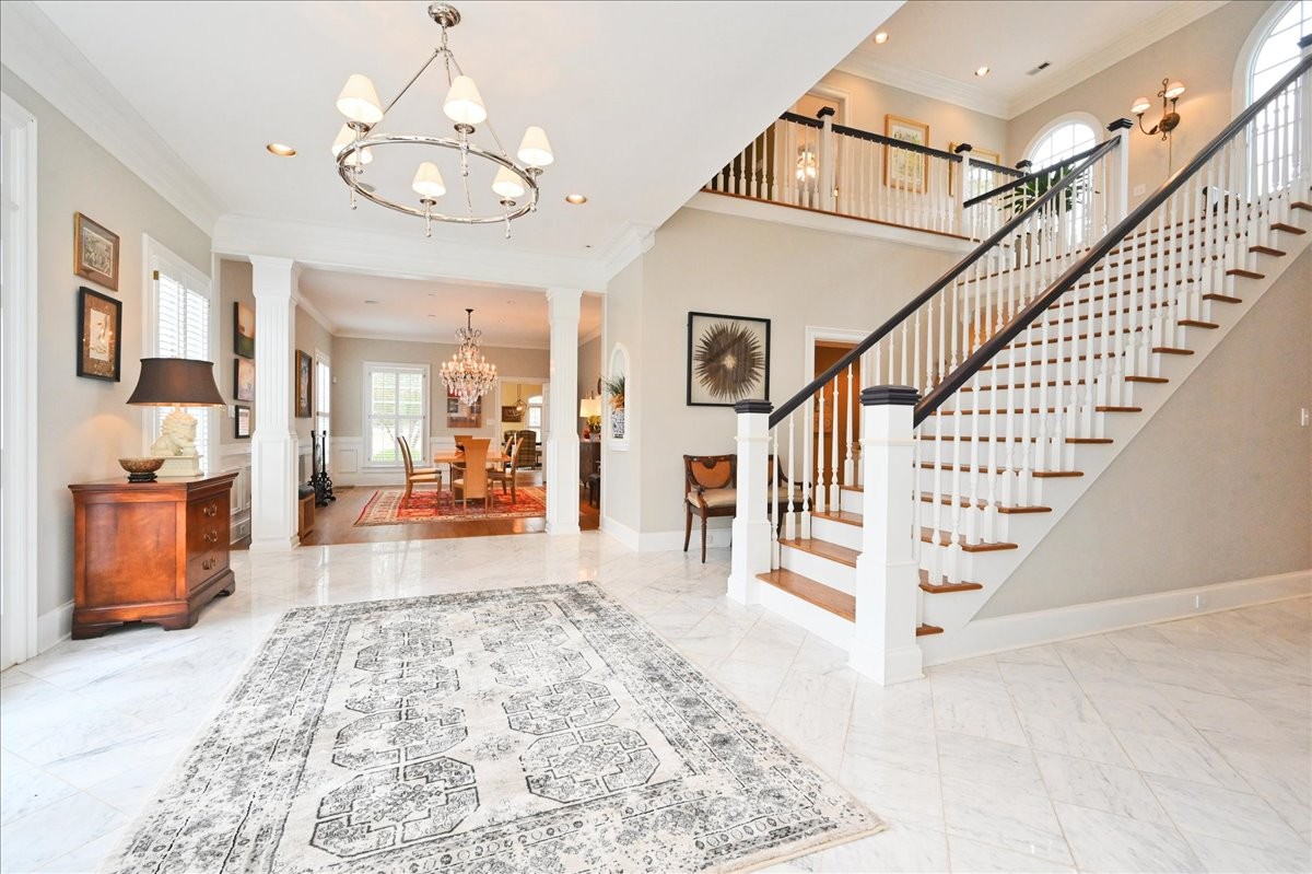 3062 Lower River Road Southeast Decatur, AL 35603 - Photo 11 of 70 a view of a hallway with wooden floor and staircase