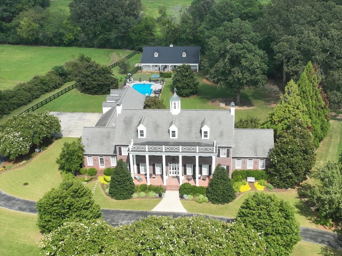 3062 Lower River Road Southeast Decatur, AL 35603 - Photo 2 of 70 an aerial view of a house with a garden and a yard