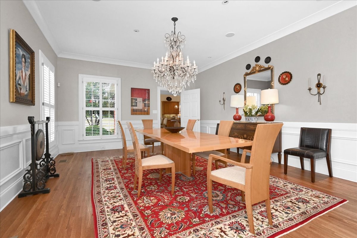 3062 Lower River Road Southeast Decatur, AL 35603 - Photo 23 of 70 a view of a dining room with furniture window and wooden floor