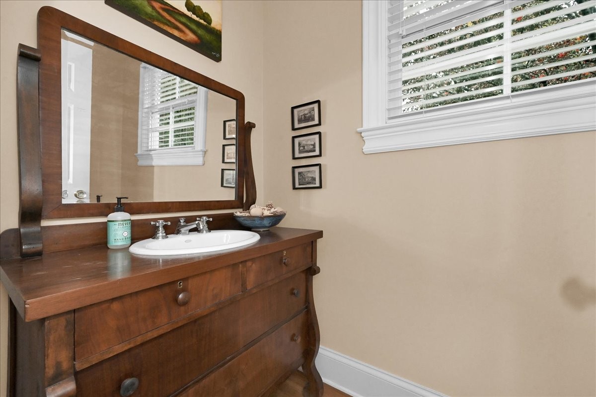 3062 Lower River Road Southeast Decatur, AL 35603 - Photo 39 of 70 a bathroom with a sink and a mirror