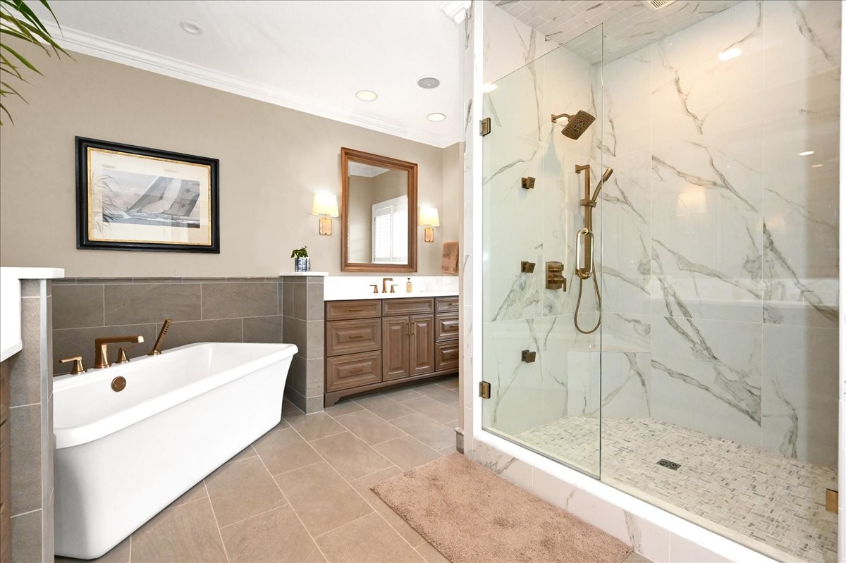3062 Lower River Road Southeast Decatur, AL 35603 - Photo 42 of 70 a bathroom with a tub sink shower and mirror