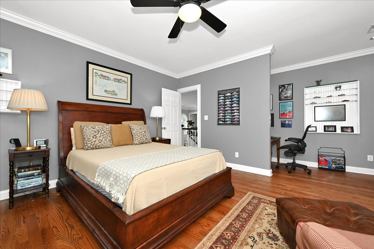 3062 Lower River Road Southeast Decatur, AL 35603 - Photo 52 of 70 a bedroom with a bed and a chandelier