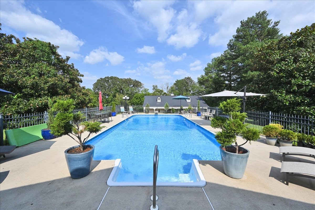 3062 Lower River Road Southeast Decatur, AL 35603 - Photo 62 of 70 a view of a patio with couches and potted plants