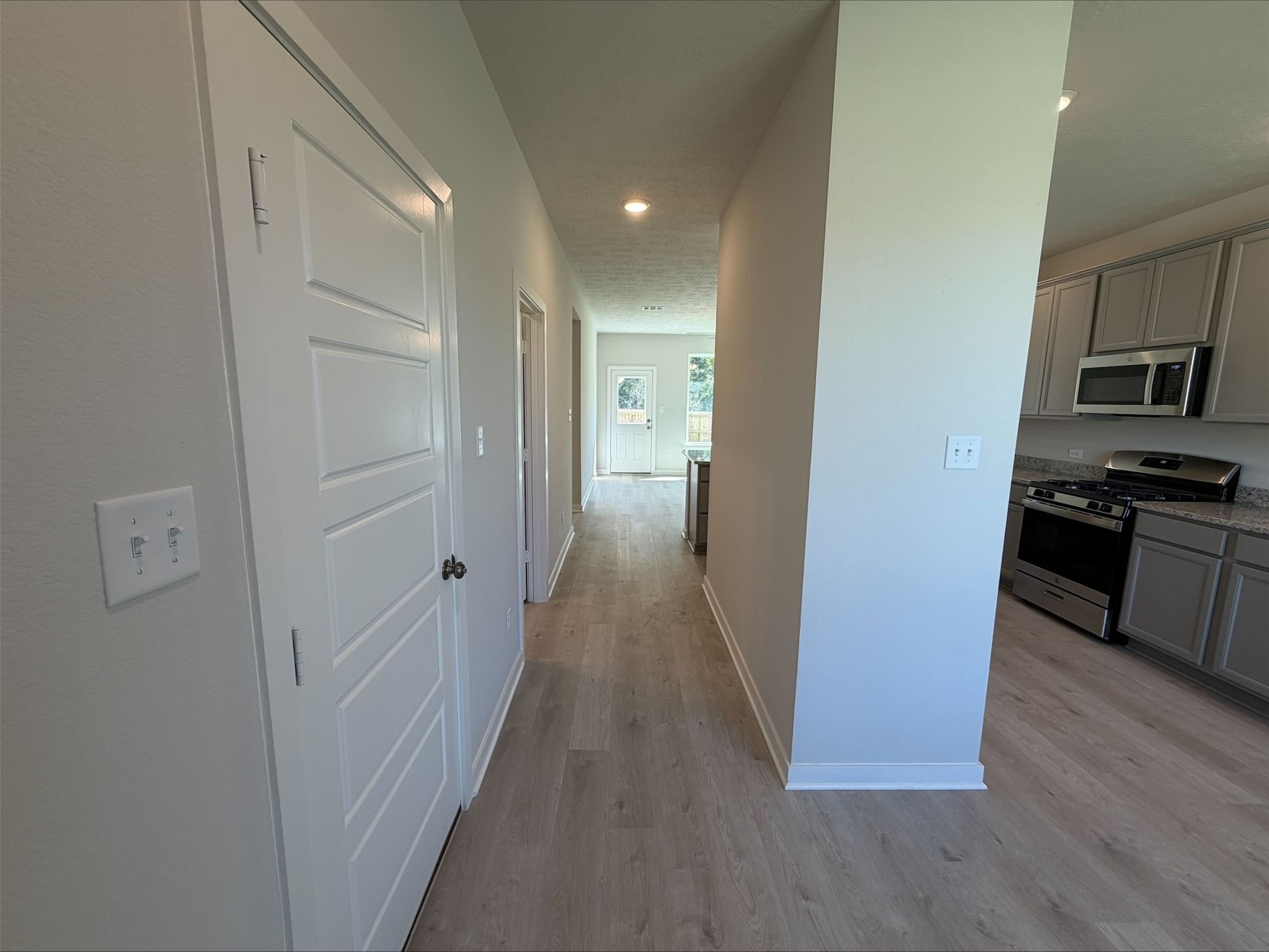 237 New Dawn Trail Huntsville, TX 77320 - Photo 2 of 23 a view of a kitchen from the hallway