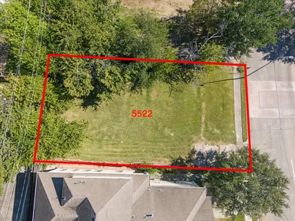 an aerial view of a city with lots of residential buildings