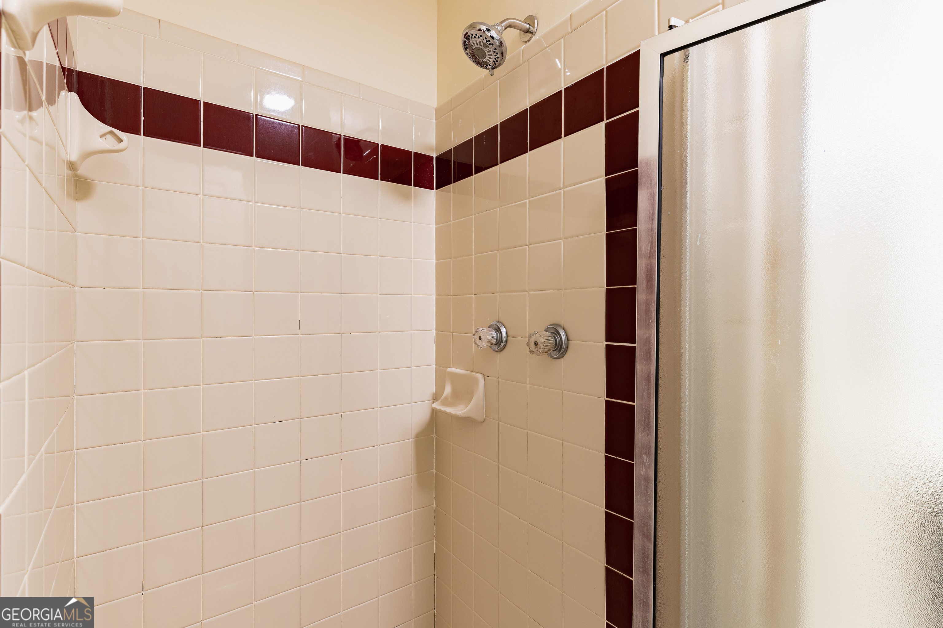 3821 Rex Mill Square Rex, GA 30273 - Photo 12 of 51 a bathroom with a shower and a glass door