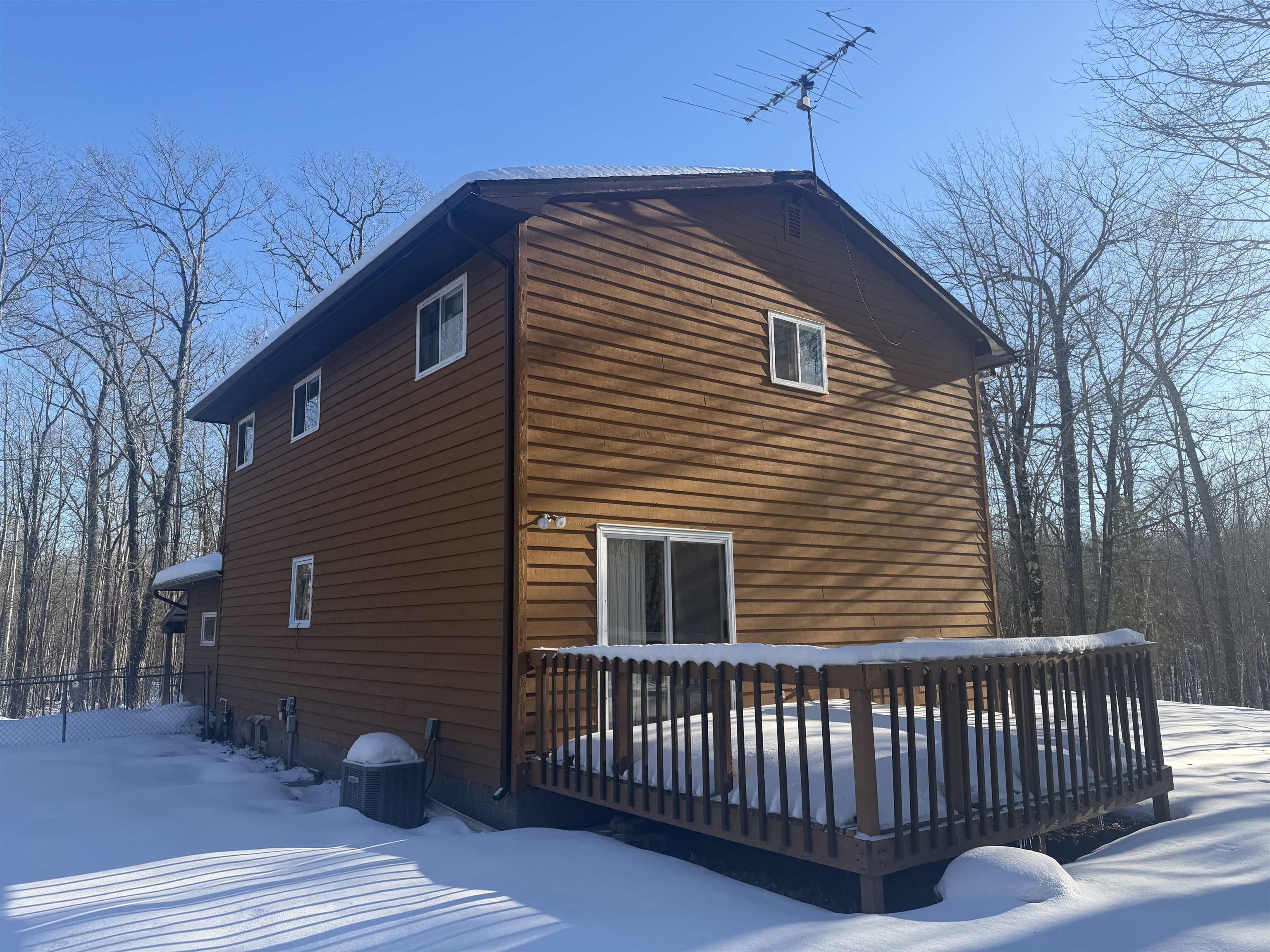 25200 Fischer Road Ashland, WI 54806 - Photo 5 of 5 View of snow covered exterior with a deck