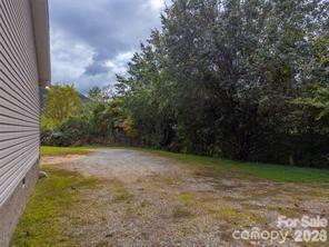 179 Fresh Water Rdg Road Whittier, NC 28789 - Photo 39 of 48 a view of a yard with an tree