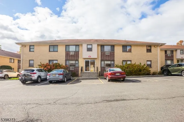 a car parked in front of a house
