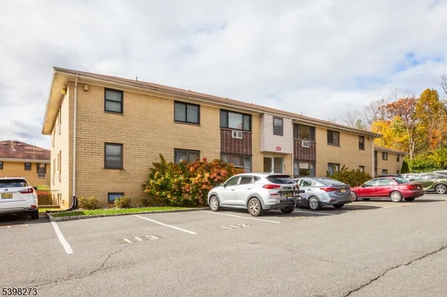 a cars parked in front of a house