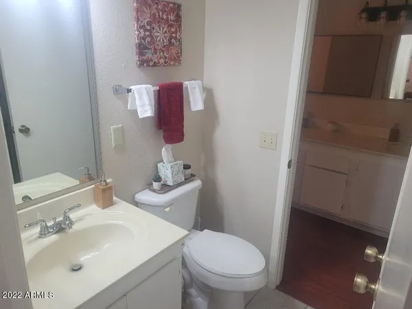 a bathroom with a sink and a toilet