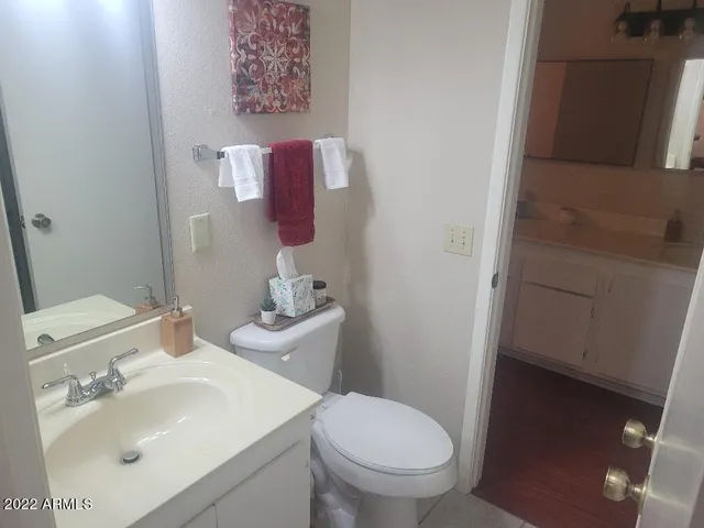 a bathroom with a sink and a toilet