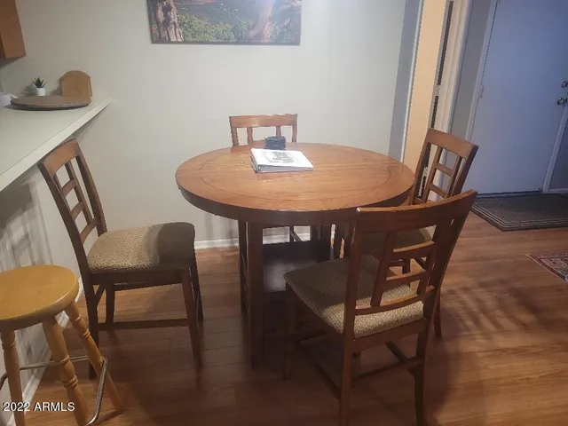 a view of a dining room with furniture