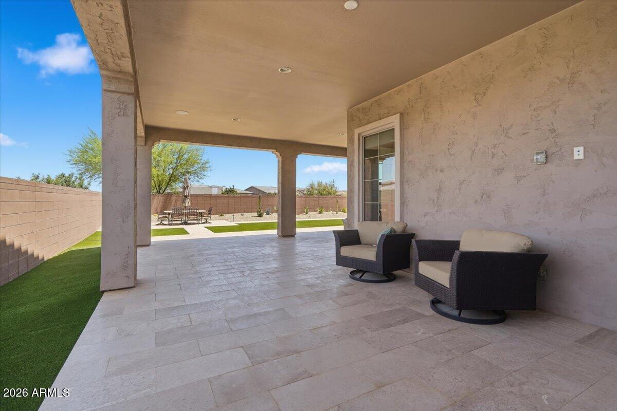 22608 East Stacey Road Queen Creek, AZ 85142 - Photo 55 of 83 a view of an empty room with furniture and floor to ceiling window