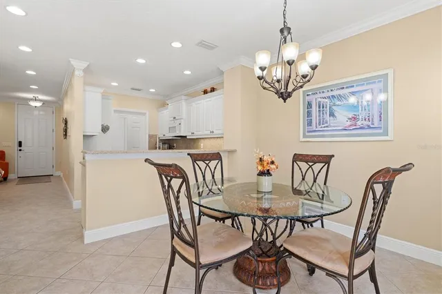 a living room with furniture and stairs