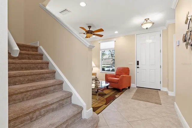 a bathroom with a double vanity sink mirror and shower