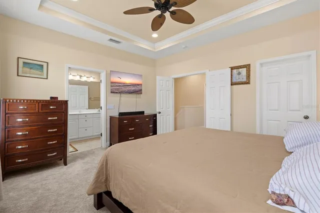 a view of a patio with table and chairs with wooden floor and plants