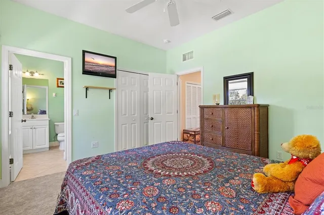 an aerial view of a house with a ocean view