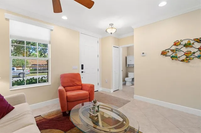 a bathroom with a toilet sink and a mirror