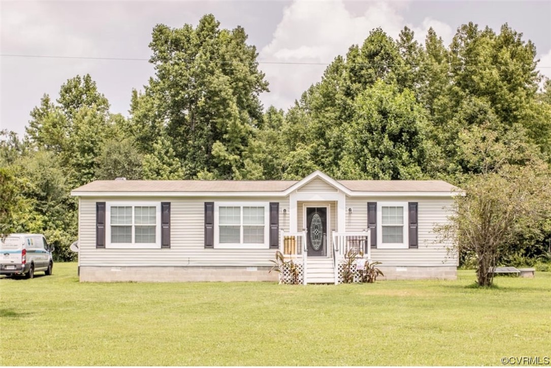 6302 Grubby Road Wilsons, VA 23894 - Photo 1 of 19 a view of a house with swimming pool and porch with furniture