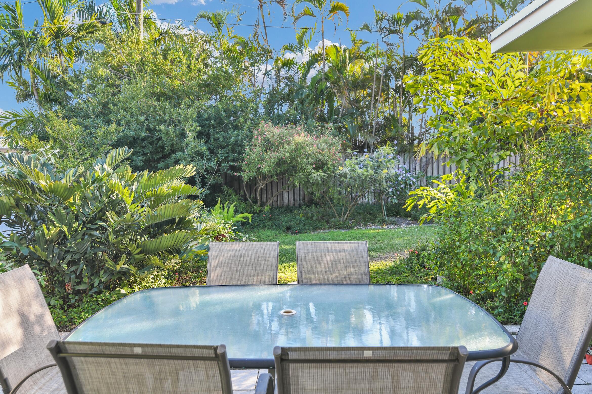 1290 Southwest 8th Street Boca Raton, FL 33486 - Photo 29 of 36 a view of outdoor sitting area with furniture