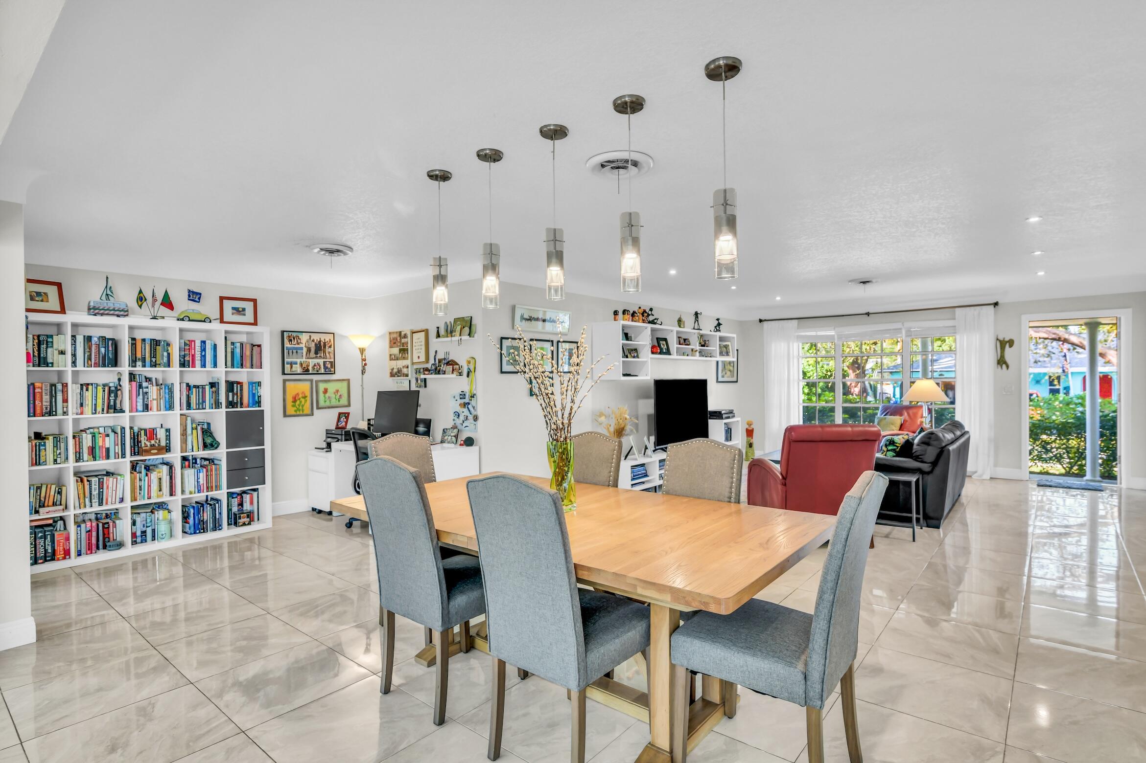1290 Southwest 8th Street Boca Raton, FL 33486 - Photo 8 of 36 a view of a dining room with furniture