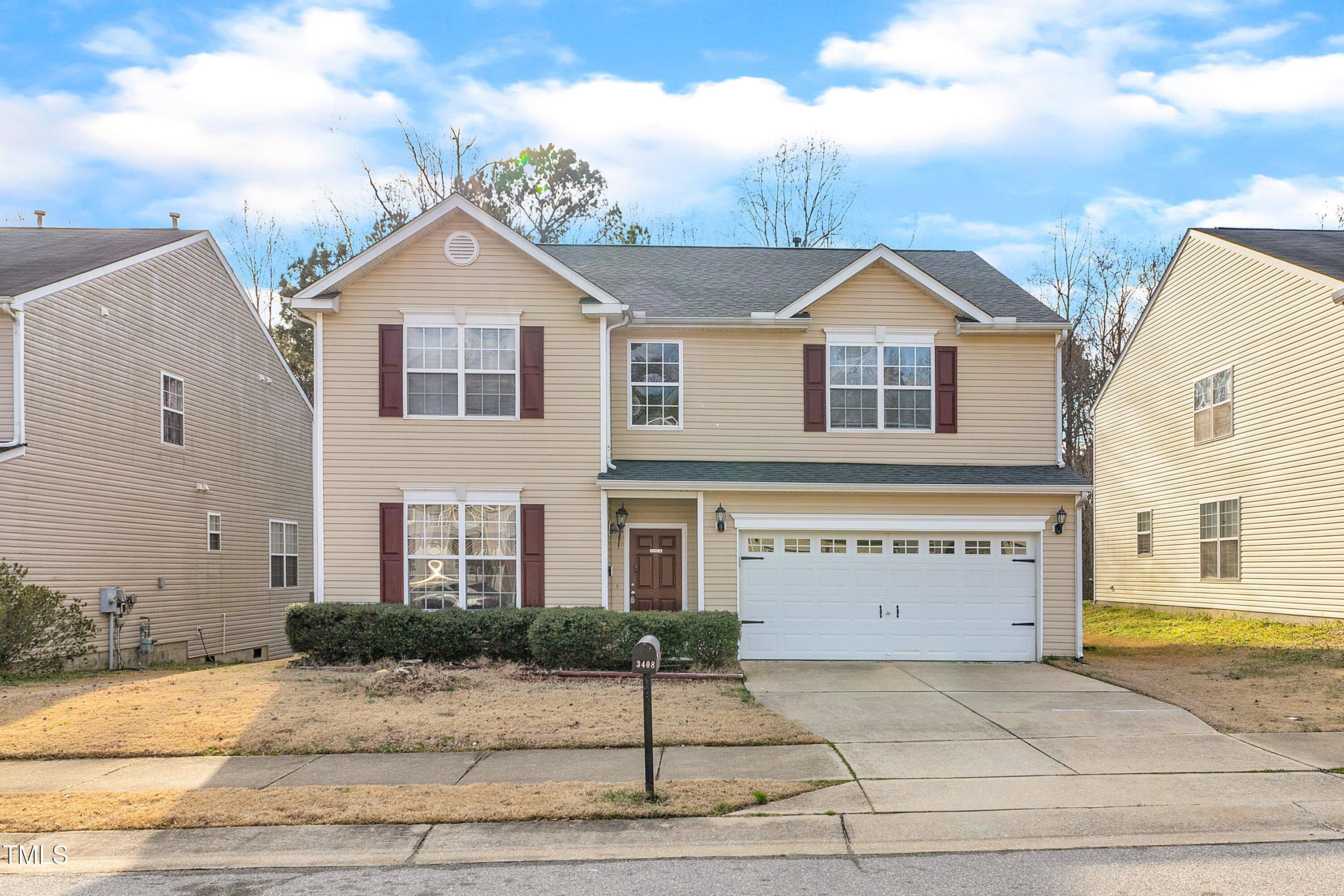 3408 Dutchman Road Raleigh, NC 27610 - Photo 2 of 54 a front view of a house with a yard