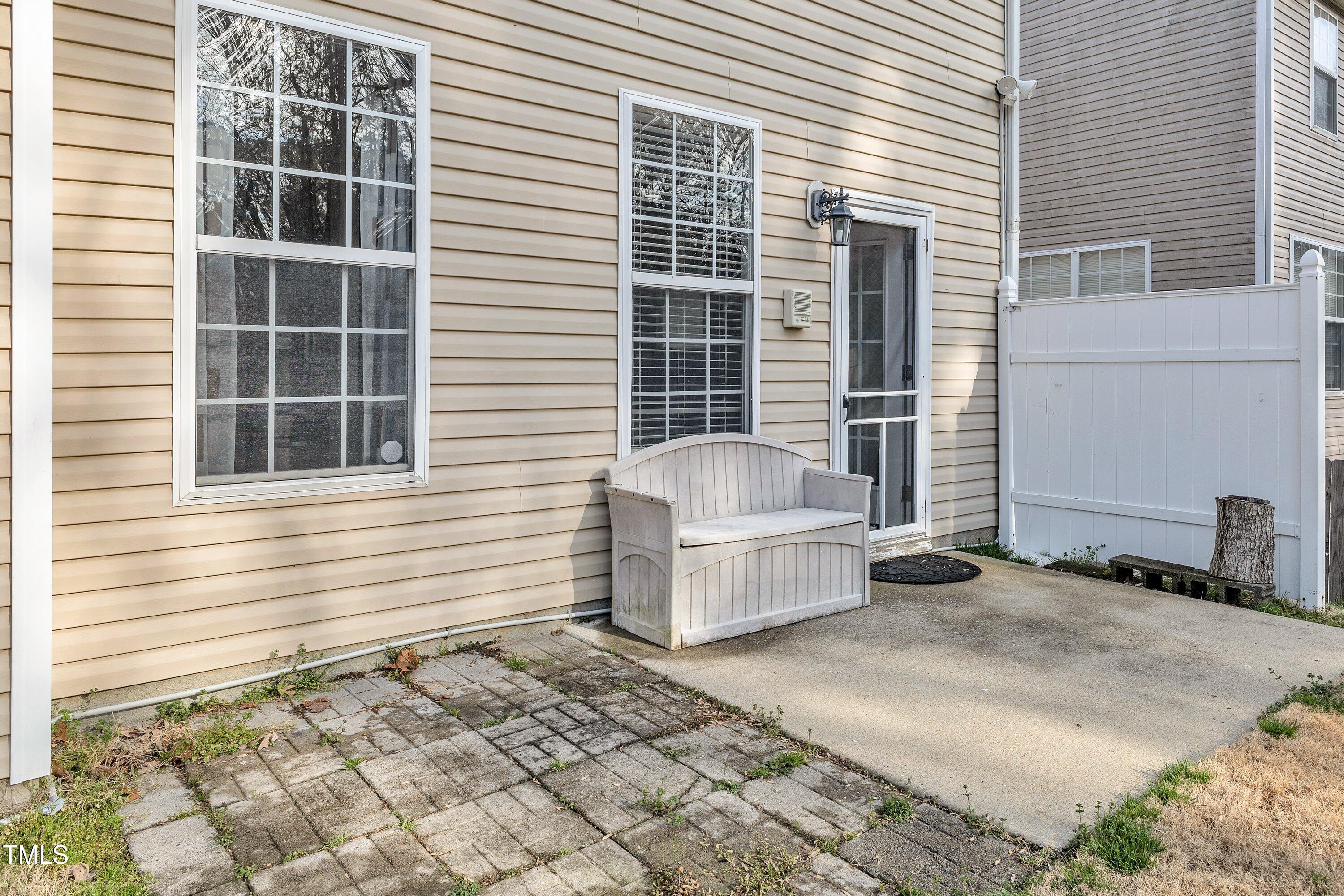 3408 Dutchman Road Raleigh, NC 27610 - Photo 53 of 54 a white house with a outdoor space