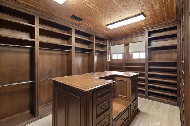 a kitchen with a stove and a refrigerator