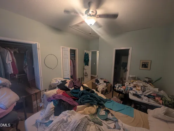 a room with furniture toys and a chandelier